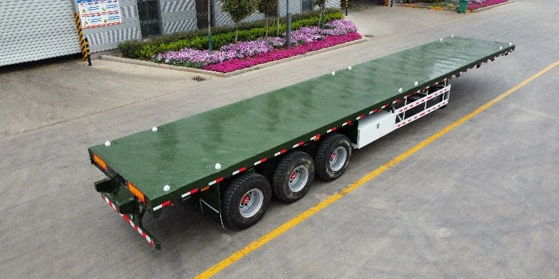3‑axle 40ft flatbed semi‑trailer Vehicle‑Master factory unit for container and heavy‑cargo logistics 3‑axle 40ft flatbed semi‑trailer Vehicle‑Master factory unit for container and heavy‑cargo logistics