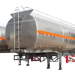 Silver tanker trailer with top walkway and front ladder