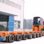 Multi-axle trailer carrying a large load