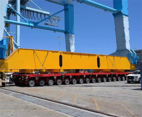 product-1-1 Modular heavy-haul trailer carrying a large yellow structure