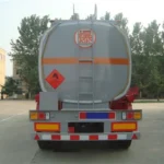 Rear view of a silver tanker with rear safety markings