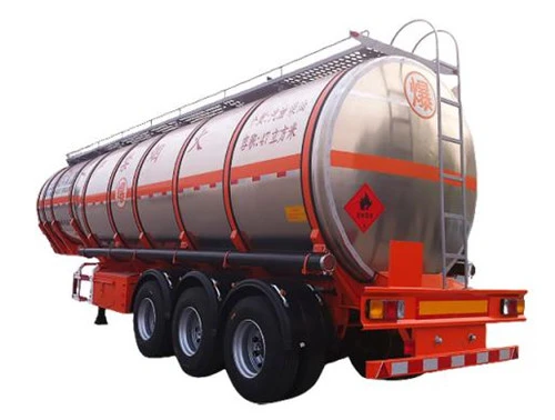 Rear three-quarter view of a silver tanker trailer