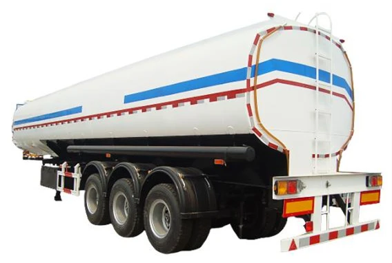 Rear view of a white tanker with blue and red stripes