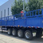 Semi-remorque à paroi grillagée 4 essieux 40 tonnes pour machinerie