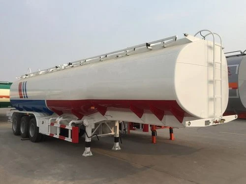 White tanker trailer viewed from the front side