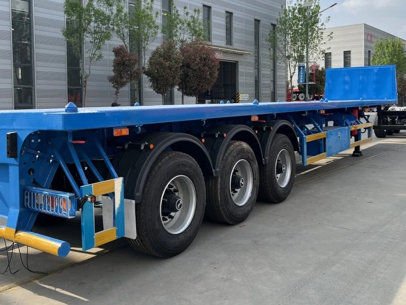 Manufactured 12m flatbed semi trailer, heavy‑duty flat‑deck unit for container and bulk goods hauling Manufactured 12m flatbed semi trailer, heavy‑duty flat‑deck unit for container and bulk goods hauling