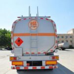 Rear view of a silver tanker and rear ladder