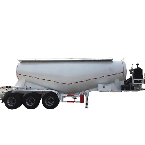 Side view of a white powder tanker and discharge equipment