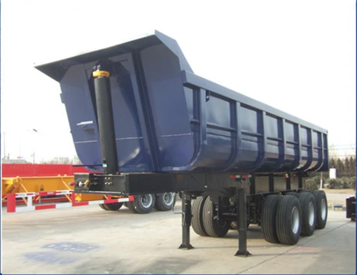 Dark dump semi-trailer viewed from the front side