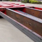 Close-up of the trailer main beams and frame cross-members