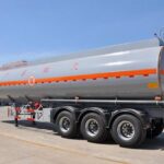 Silver tanker trailer viewed from the rear side