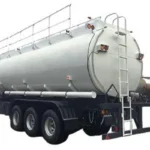 White tanker with top walkway and rear-mounted equipment