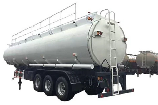 White tanker with top walkway and rear-mounted equipment